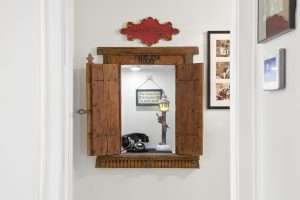 Photos like this historic phone nook feature help sell historic homes